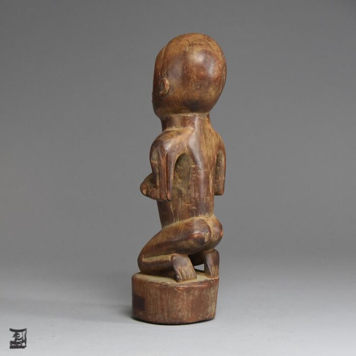 A classic theme in Yombé art, this Yombe Maternity sculpture is an enduring Madonna icon of the Kongos.