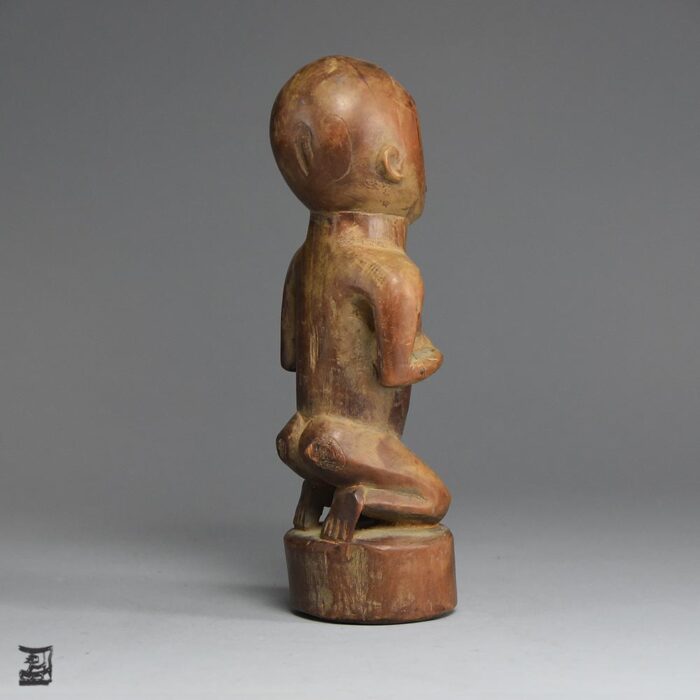 A classic theme in Yombé art, this Yombe Maternity sculpture is an enduring Madonna icon of the Kongos.